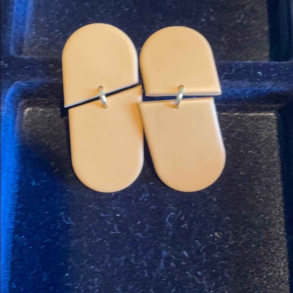 Ivory and bow polymer clay earrings